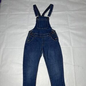 Dark wash denim overalls with adjustable straps and pockets